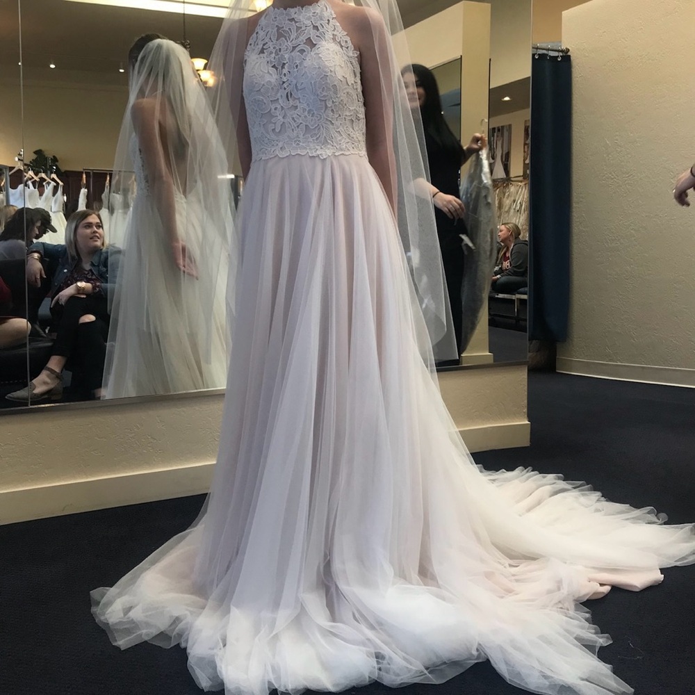 Wedding dress never worn fits like a size zero